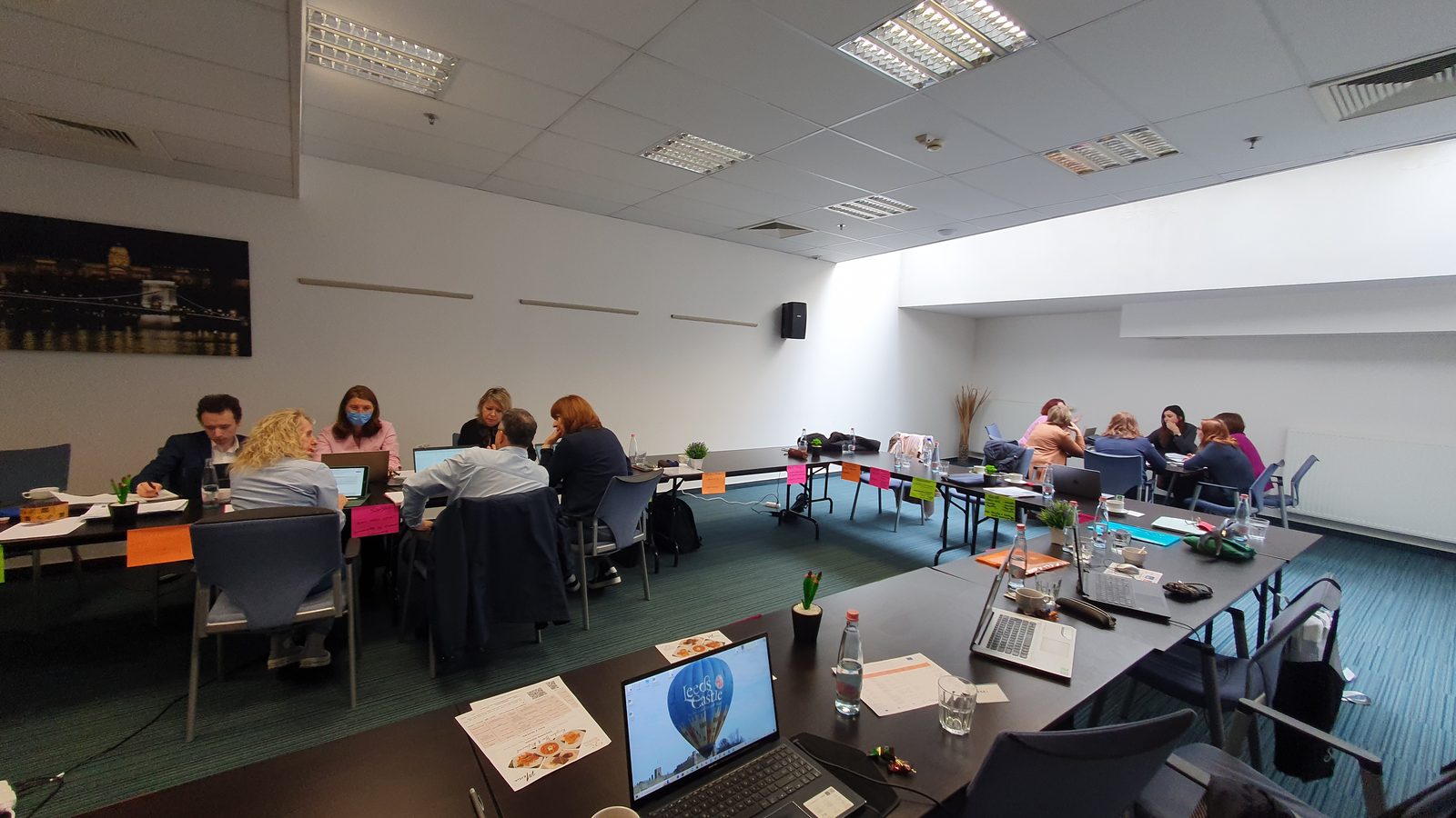 F3 partners working around the table in Budapest